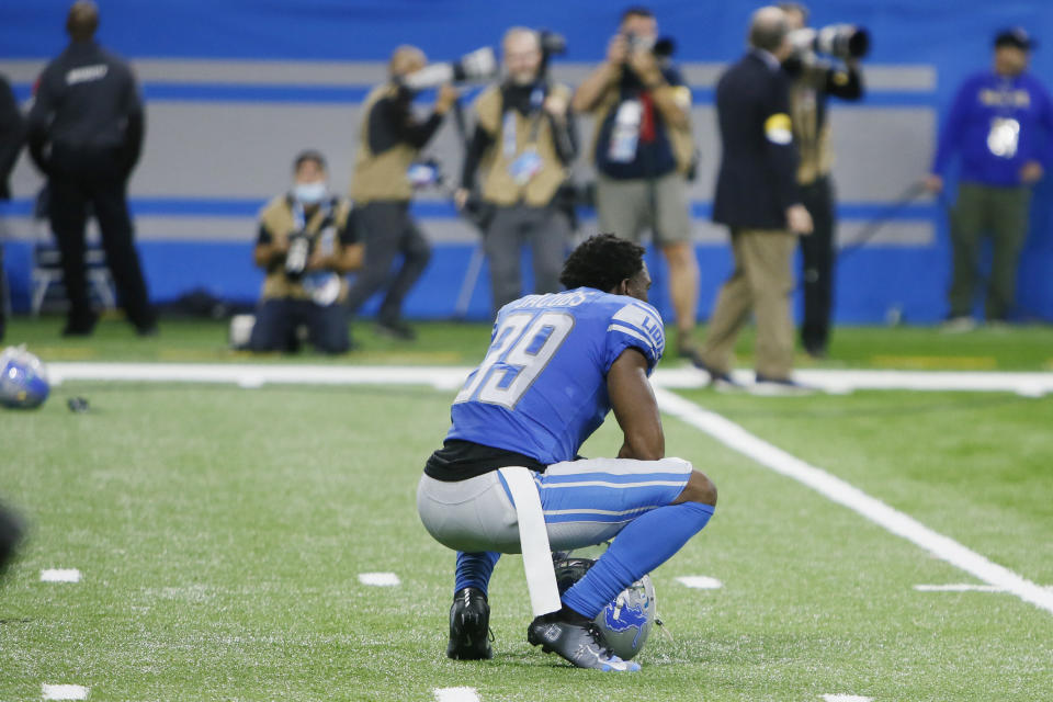 Detroit Lions cornerback Jerry Jacobs squats on the field after the Chicago Bears kicked a winning field goal with time expiring to win the NFL football game, Thursday, Nov. 25, 2021, in Detroit. (AP Photo/Duane Burleson)