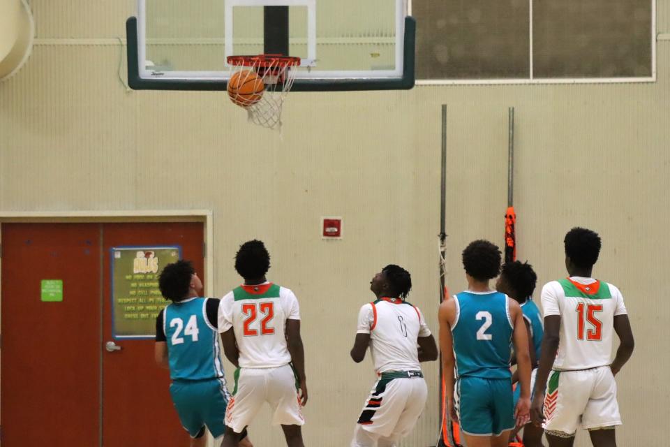 Atlantic’s Kevine Ulysse watches his shot sink in the Eagles’ season opener. Royal Palm Beach boys basketball defeated the Eagles, 73-66, at Atlantic High on November 22, 2023.