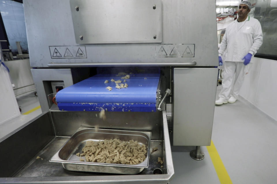 Cultivated chicken is processed at the Believer Meats facility in Rehovot, Israel on Feb. 13, 2023. More than 150 startups are chasing an ambitious goal: meat that doesn’t require raising and killing animals that is affordable and tastes and feels like the meat we eat now. (AP Photo/Emma H. Tobin)