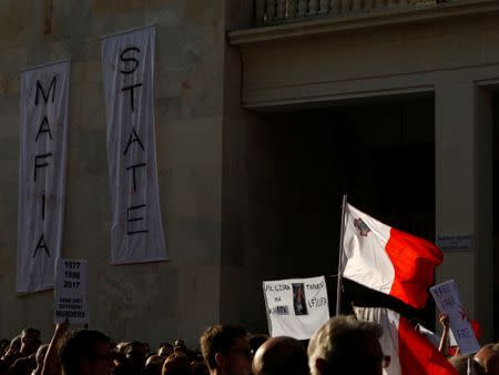People protest against the assassination of investigative journalist Daphne Caruana Galizia last Monday, in Valletta, Malta, October 22, 2017. REUTERS/Darrin Zammit Lupi