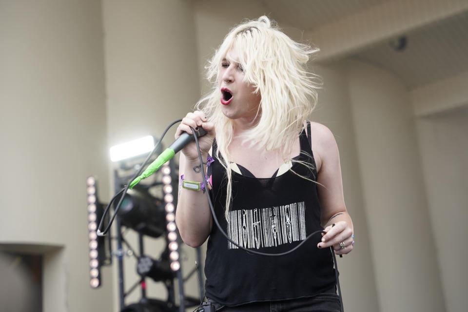 FILE - Laura Les of 100 Gecs performs on day one of the Lollapalooza Music Festival in Chicago on July 28, 2022. 100 Gecs', “Dumbest Girl Alive” was named one of the top songs of the year by The Associated Press. (Photo by Rob Grabowski/Invision/AP, File)