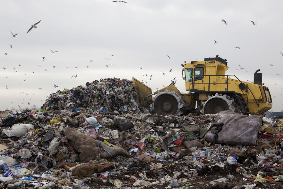 <p>£17,591 annual salary, 33 deaths: Operating bulldozers and other big machinery on landfill sites, or driving refuse vehicles has resulted in more than 30 deaths between 2011 and 2016 (Newscast/UIG via Getty Images) </p>