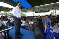 Presidential candidate Anies Baswedan speaks during his campaign rally in Lampung Timur, Indonesia, Sunday, Jan. 14, 2024. The former Jakarta governor seeking Indonesia's presidency said democracy is declining in the country and pledged to make changes to get it back on track. (AP Photo/Achmad Ibrahim)