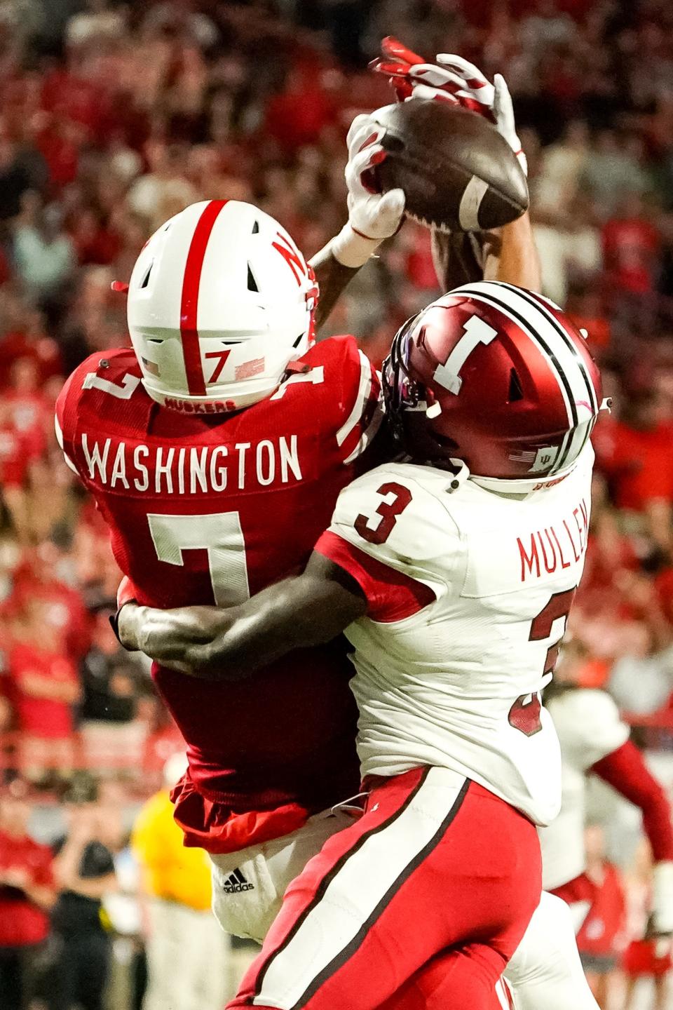 Oct 1, 2022; Lincoln, Nebraska, USA; Indiana Hoosiers defensive back Tiawan Mullen (3) breaks up a pass to Nebraska Cornhuskers wide receiver Marcus Washington (7) during the third quarter at Memorial Stadium. Mandatory Credit: Dylan Widger-USA TODAY Sports