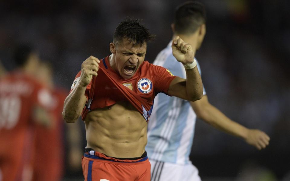 Chile's forward Alexis Sanchez reacts after missing a chance against Chile  - Credit: AFP