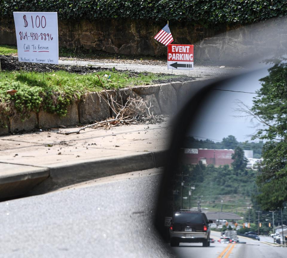 A sign along Ann Street for $100 parking space for event parking in downtown Pickens, S.C. Thursday, June 29, 2023. Former U.S. President Donald J. Trump is scheduled to speak around 1 p.m. Saturday. 