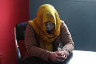 A female TV presenter from southern Afghanistan hides her identity for security concerns as she gives an interview to The Associated Press in Kabul, Afghanistan, Wednesday, Feb. 3, 2021. In just the last six months, 15 journalists have been killed in a series of targeted killings spreading fear among Afghanistan’s journalist community. Along with journalists, Judges, lawyers and activists have also been targeted in a wave of assassinations since Washington signed a peace deal with the Taliban a year ago. (AP Photo/Rahmat Gul)