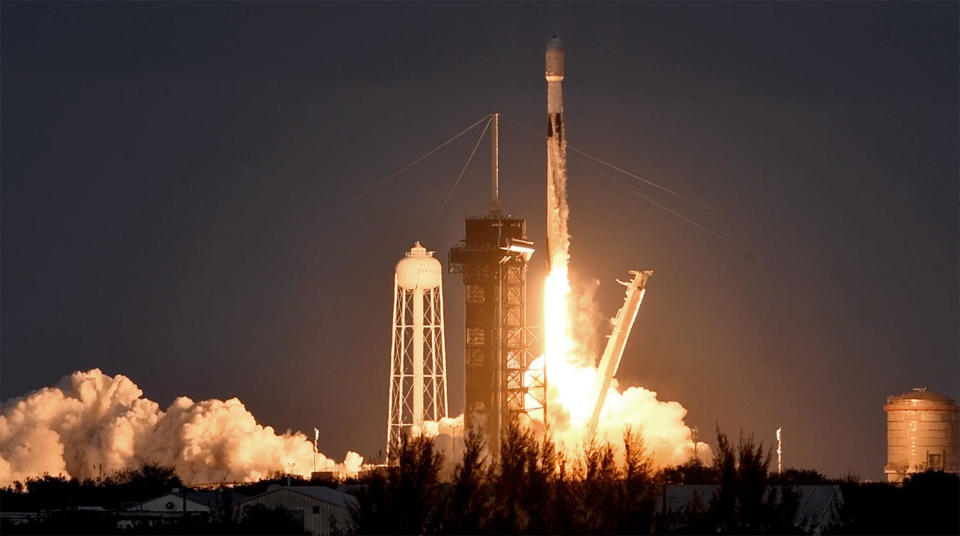 A SpaceX Falcon 9 rocket blasts off from the Kennedy Space Center carrying 40 OneWeb internet satellites. Both SpaceX and OneWeb are deploying space-based broadband relay satellites, but the companies are targeting different segments of the communications marketplace with the former selling Starlink service direct to consumers while the latter focuses on government agencies and businesses. / Credit: William Harwood/CBS News