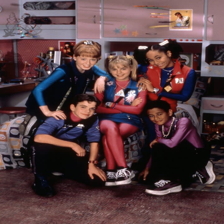 Zenon and her friends at the station