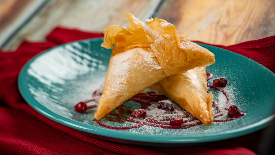 <p>How good do these amond phyllo pockets look? For sale at Morocco's Tangierine Café: Flavors of the Medina, the delectable dessert is made with white chocolate pomegranate and milk chocolate orange. </p> <p><strong>Other new food items available at Tangierine Café: Flavors of the Medina:</strong></p> <p>Grilled kebabs: with carrot-chickpea salad and garlic aïoli</p> <p>Lamb kefta (gluten/wheat-friendly)</p> <p>Harissa chicken (gluten/wheat-friendly)</p> <p>Stone-baked Moroccan bread: with hummus, fig tapenade and Zhoug dip</p> <p>Carrots three ways: Berbere-spiced grilled carrots, pickled carrots, and carrot ginger purée (plant-based)</p> <p><strong>And beverages:</strong></p> <p>Chai tea mint mimosa: twinings of London Chai Tea with Key Lime Sparkling Wine and mint</p> <p>Swilled Dog Sangria Hard Cider (Upper Tract, West Virgina)</p> <p>3 Daughters Brewing Chai Hard Cider (St. Petersburg, Florida)</p> <p>Blake's Hard Cider Co. Berry Cranders Hard Cider (Armada, Michigan)</p> <p>Cider flight</p>
