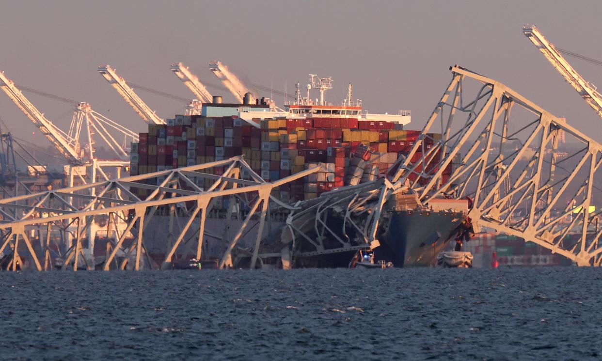 <span>Baltimore's Francis Scott Key Bridge collapses after being struck by cargo ship.</span><span>Photograph: Rob Carr/Getty Images</span>