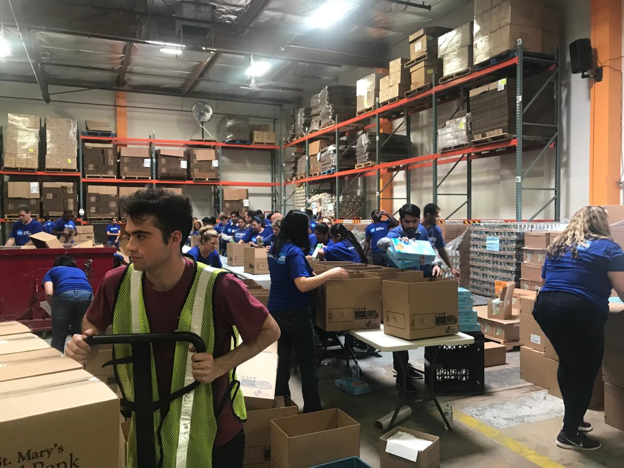 Volunteers at St. Mary's Food Bank pack and distribute more than 40,000 emergency boxes each month.