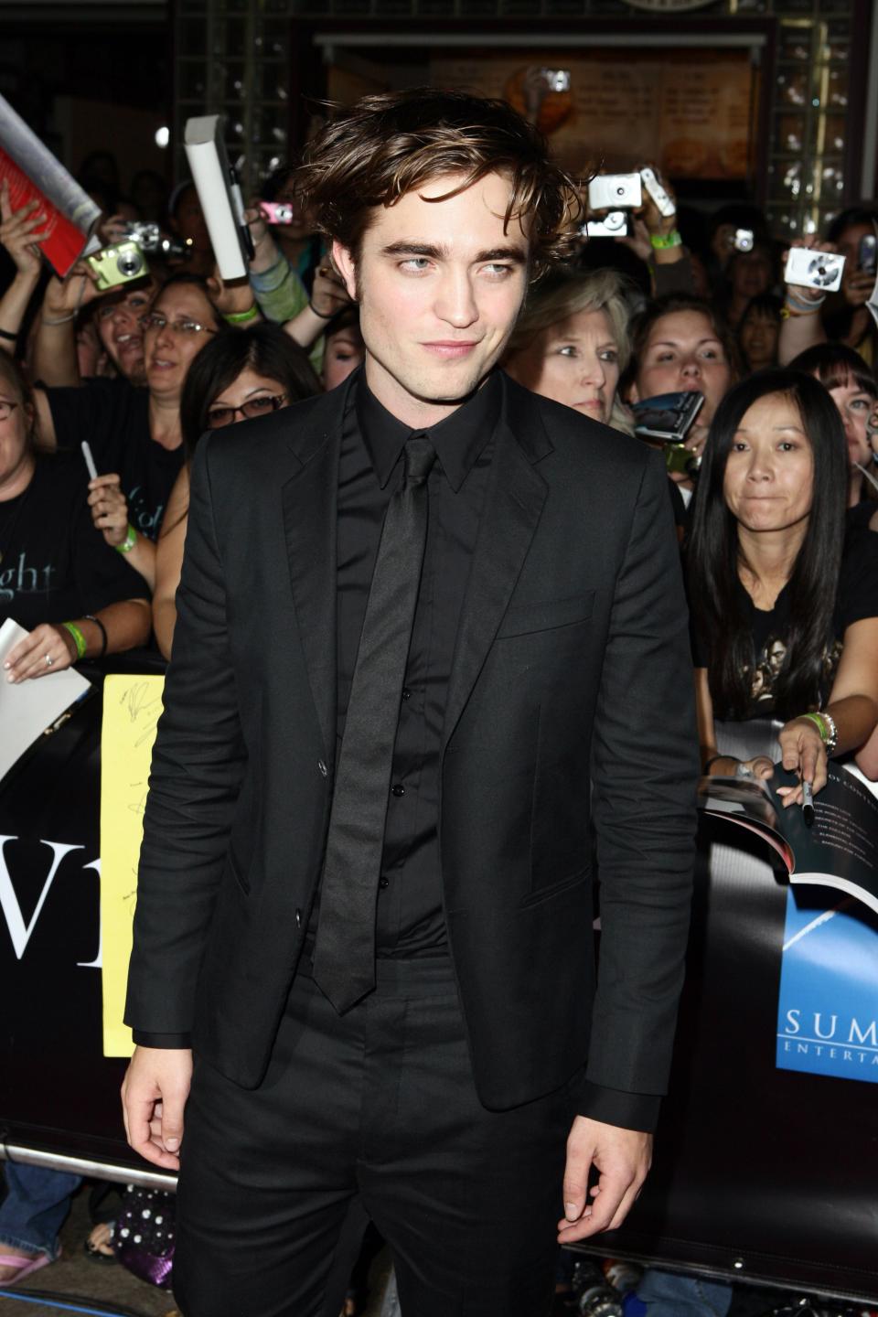 Robert Pattinson in a black suit