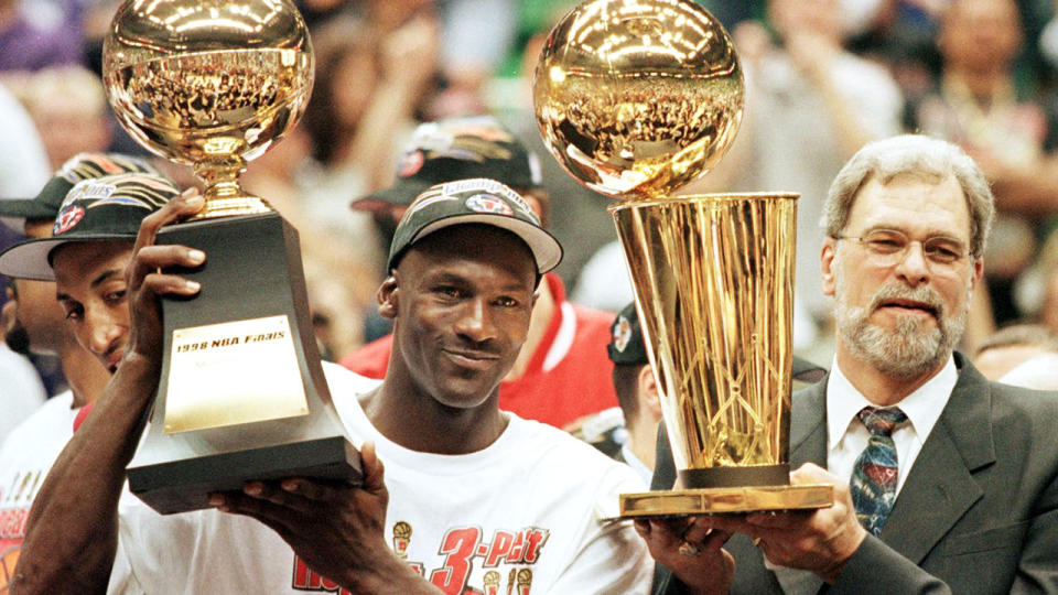 Pictured here, Michael Jordan and coach Phil Jackson after the Bulls won their sixth NBA championship.