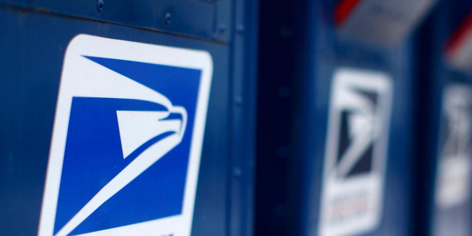 FILE PHOTO: A view shows U.S. postal service mail boxes at a post office in Encinitas, California in this February 6, 2013, file photo. .  REUTERS/Mike Blake