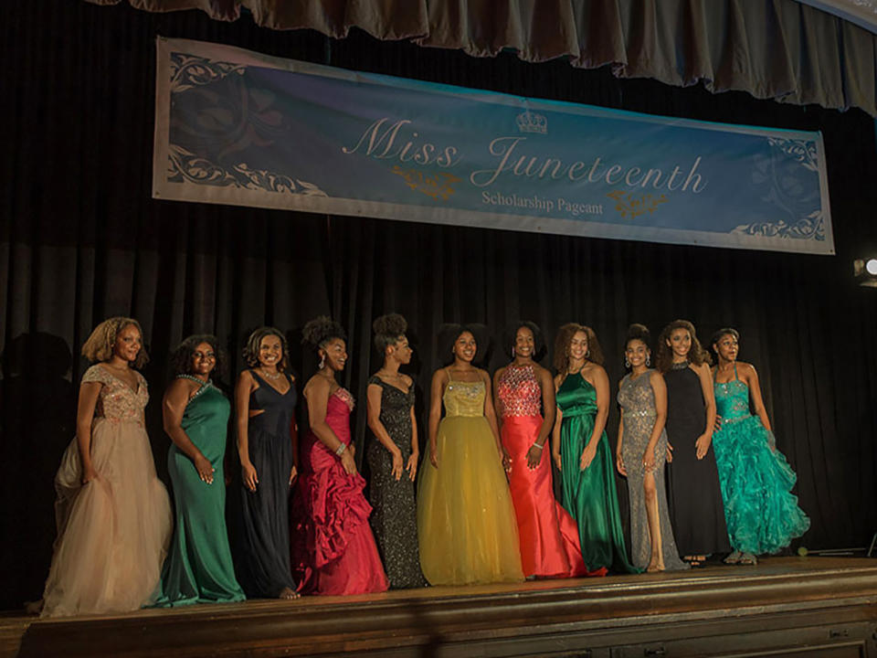 Alexis Chikaeze, centre, takes her place at the Miss Juneteenth pageantVertigo