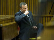 Oscar Pistorius yawns as he listens to forensic evidence being given in court in Pretoria, South Africa, Thursday, April 17, 2014. One of Oscar Pistorius’ defense experts was grilled by the chief prosecutor for the second day at the Olympic runner’s murder trial Thursday, with forensic specialist Roger Dixon’s expertise and professionalism in conducting various tests regarding Reeva Steenkamp’s shooting death again sternly questioned. Pistorius is charged with premeditated murder for shooting Steenkamp multiple times on Feb. 14, 2013. Prosecutors say that he killed Steenkamp after a fight. The trial was adjourned until May 5. (AP Photo/Alet Pretorius, Pool)