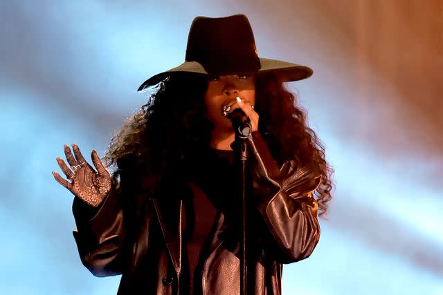 <p>Kevin Winter/Getty</p> SZA performs onstage during the 66th GRAMMY Awards at Crypto.com Arena on February 04, 2024 in Los Angeles, California.