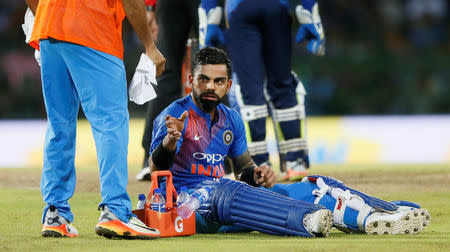 Cricket - Only T20 Match - Sri Lanka v India - Colombo, Sri Lanka - September 6, 2017 - India's captain Virat Kohli rests. REUTERS/Dinuka Liyanawatte