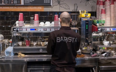 Barista at Costa preparing a coffee - Credit: RayArt Graphics / Alamy Stock Photo