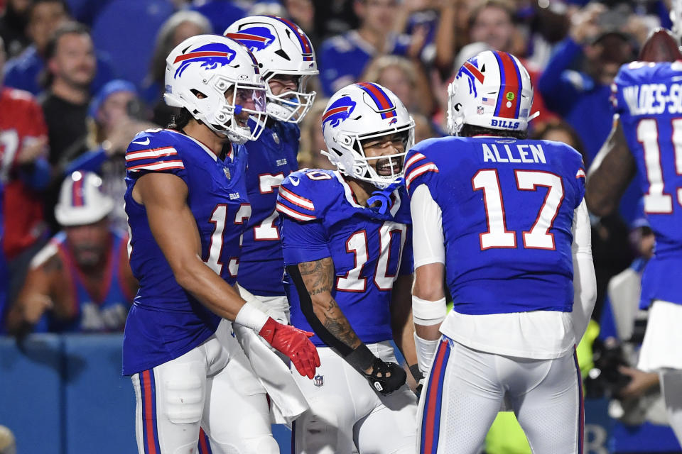 Buffalo Bills wide receiver Khalil Shakir (10) celebrates his touchdown catch with teammates during the first half of an NFL football game against the Jacksonville Jaguars, Monday, Sept. 23, 2024, in Orchard Park, NY. (AP Photo/Adrian Kraus)