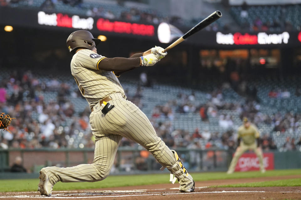 San Diego Padres' Juan Soto hits a home run during the first inning of a baseball game against the San Francisco Giants in San Francisco, Tuesday, Sept. 26, 2023. (AP Photo/Jeff Chiu)