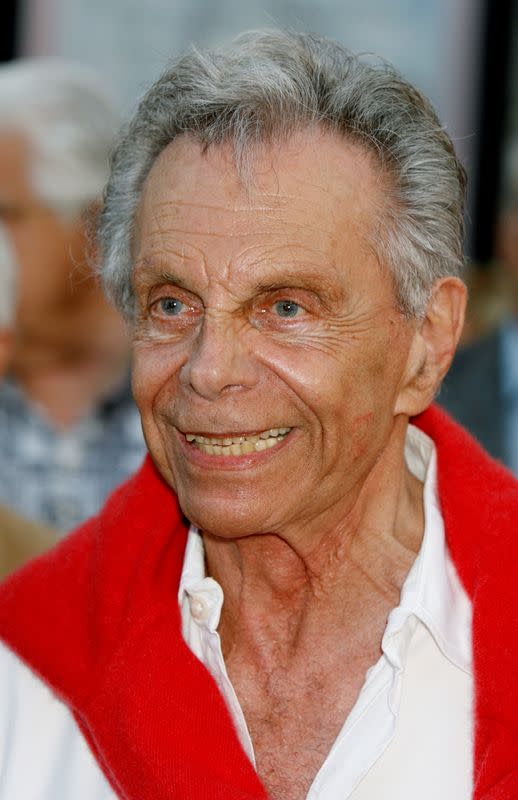 FILE PHOTO: Political satirist Mort Sahl arrives at his 80th birthday salute in Los Angeles