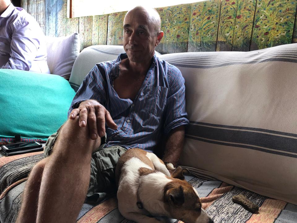 David Katz, at home with his dog, in the Golan Heights on Sept. 9, 2019.