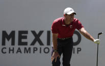 Rory McIlroy of Northern Ireland follows his tee off at the first hole during the second round for the WGC-Mexico Championship golf tournament, at the Chapultepec Golf Club in Mexico City, Mexico City, Friday, Feb. 21, 2020. (AP Photo/Fernando Llano)