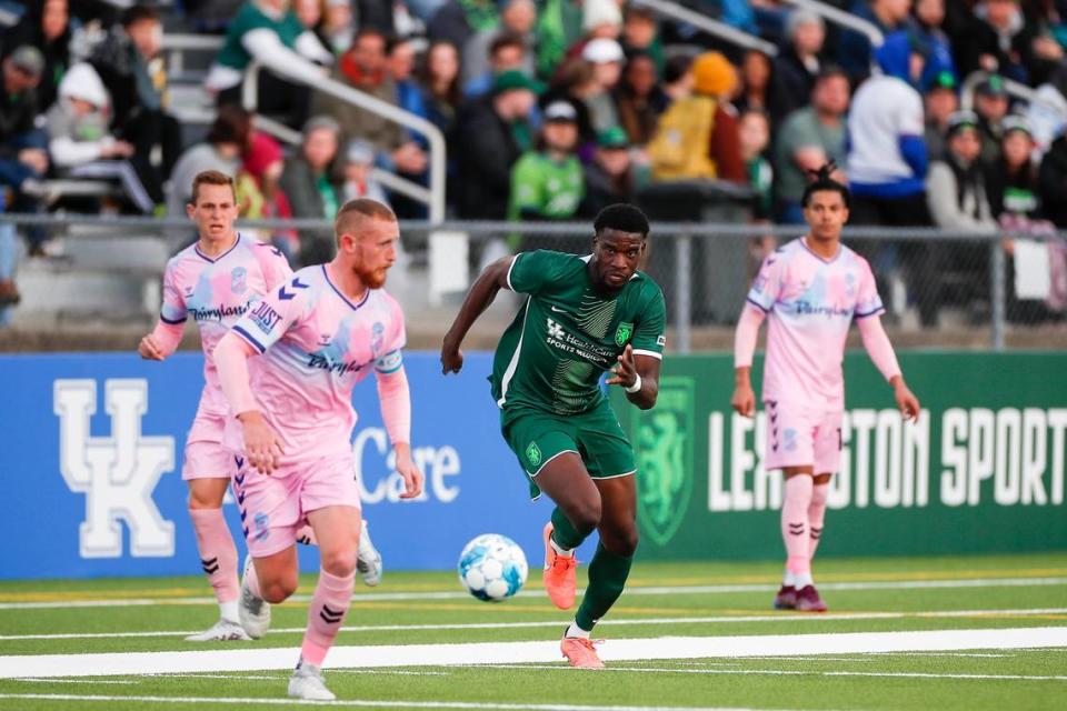 Lexington Sporting Club’s Khalid Balogun (14) tracks down the ball during the USL League One team’s first-ever home match against Forward Madison FC in Georgetown last Saturday. The teams played to a 0-0 tie.
