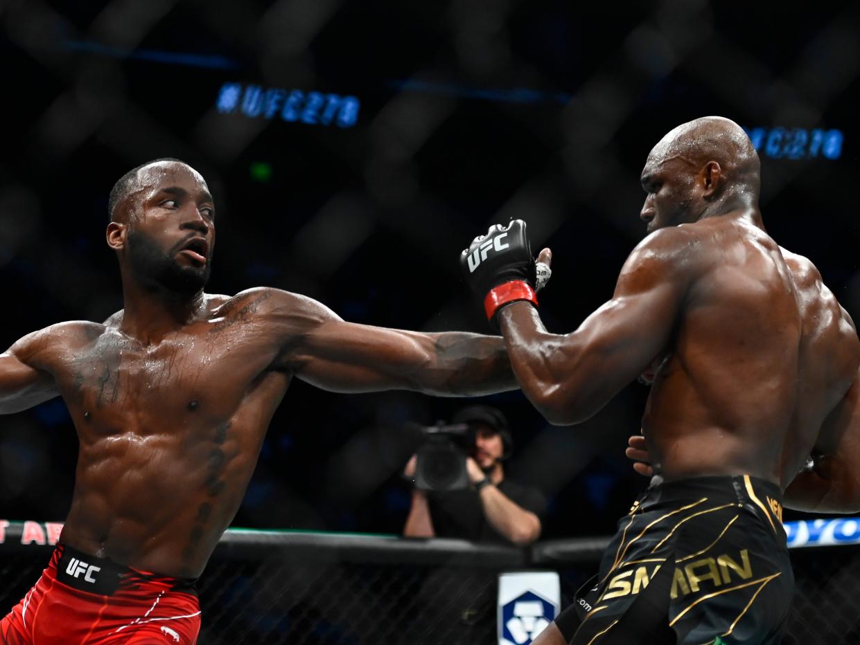 Leon Edwards (left) dethroned Kamaru Usman with a head kick in the final minute, in August (Getty Images)