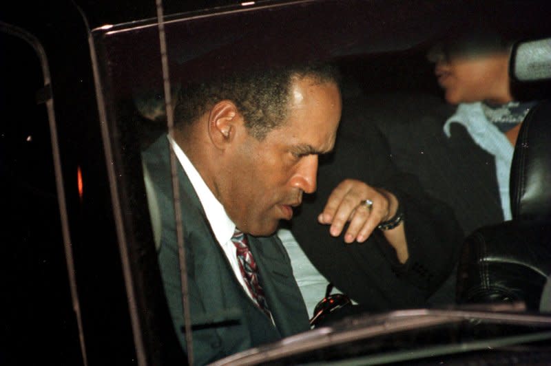O.J. Simpson arrives at the Santa Monica courthouse February 4, 1997, to hear a civil jury unanimously find him liable for the brutal killings of his ex-wife, Nicole Brown Simpson, and her friend, Ron Goldman. File Photo by Jim Ruymen/UPI