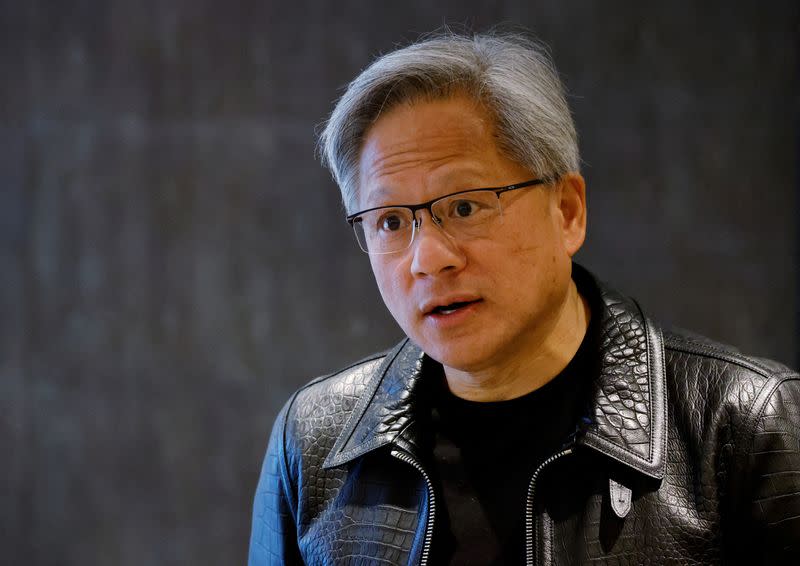 FILE PHOTO: NVIDIA’s CEO Jensen Huang attends a media roundtable meeting in Singapore