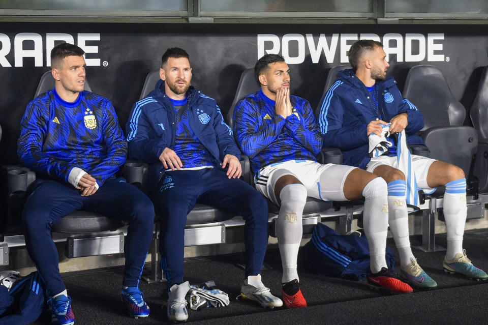 Argentina's Lionel Messi, second left, sits on the bench with teammates prior to a qualifying soccer match for the FIFA World Cup 2026 against Paraguay at Monumental stadium in Buenos Aires, Argentina, Thursday, Oct. 12, 2023. (AP Photo/Gustavo Garello)