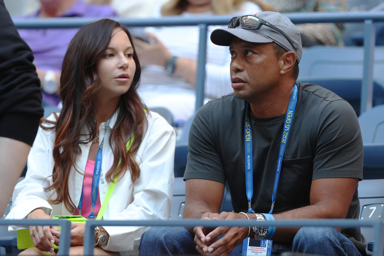 NEW YORK, NEW YORK - AUGUST 31: Erica Herman and Tiger Woods look on prior to the Women's Singles Second Round match  between Anett Kontaveit of Estonia and Serena Williams of the United States on Day Three of the 2022 US Open at USTA Billie Jean King National Tennis Center on August 31, 2022 in the Flushing neighborhood of the Queens borough of New York City. (Photo by Matthew Stockman/Getty Images)