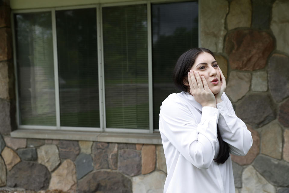 Mary Rose Maher, the daughter of Opus Bono Sacerdotii co-founder Joe Maher, visits a former Opus Bono location in Oxford, Mich., Wednesday, June 5, 2019. In a February 2017 letter to the state attorney general, she wrote, “A simple investigation into the Michigan non-profit charity Opus Bono Sacerdotii would bring to light the millions of embezzled dollars, years of mail fraud, and the constant systemic abuse of donations." (AP Photo/Paul Sancya)