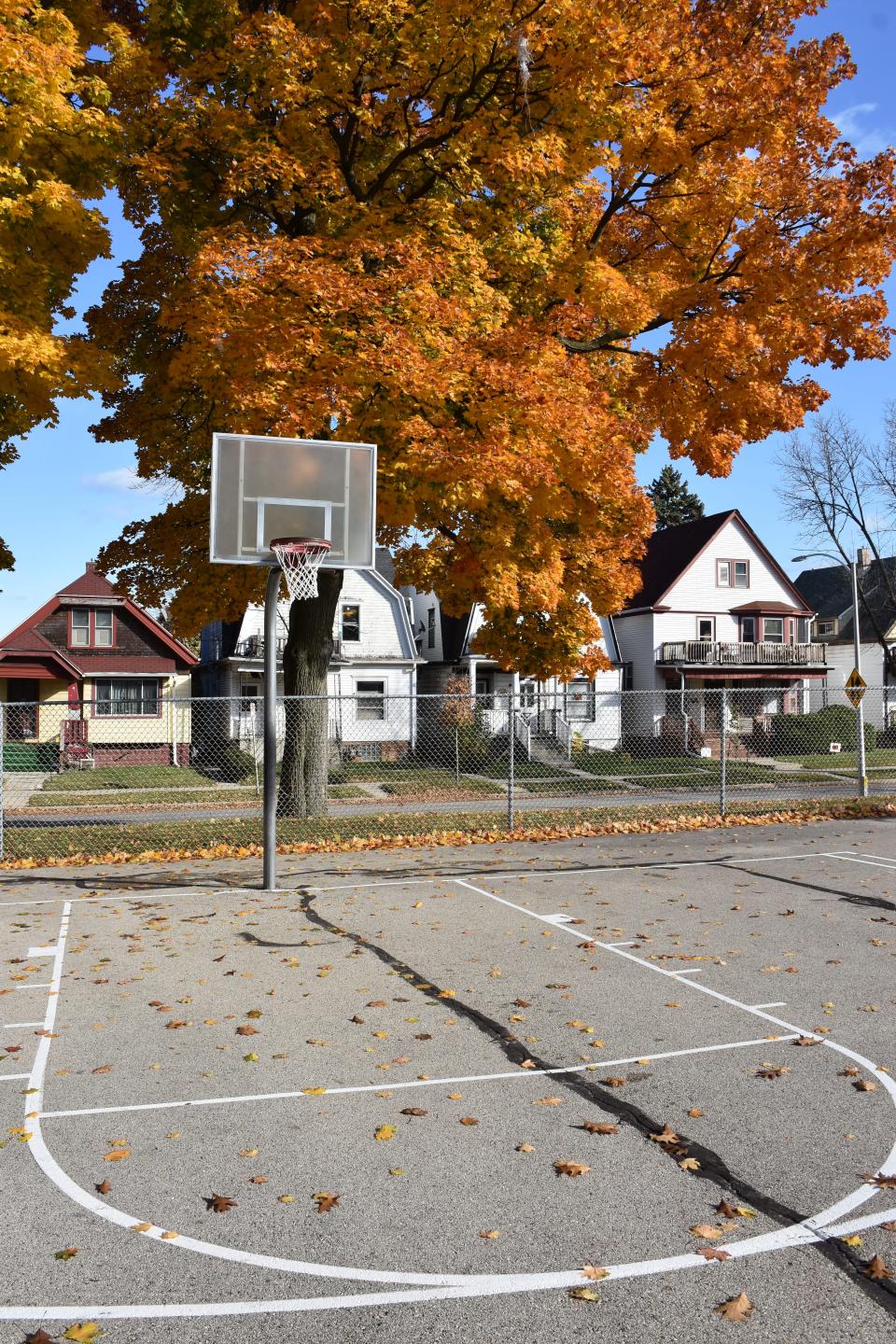 The basketball courts at Atkinson Triangle Park have been restored thanks to the Milwaukee Bucks, Colectivo Coffee, Milwaukee Parks Foundation, and Chris and Jennifer Abele.