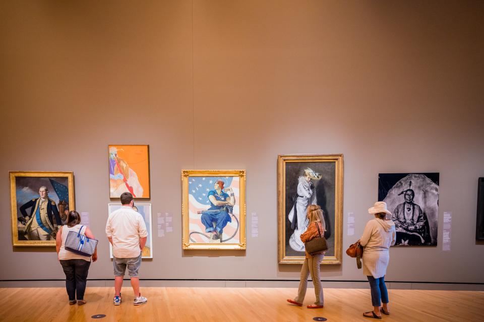 Guests enjoy the American Art Galleries at Crystal Bridges Museum of American Art in Bentonville, Arkansas.