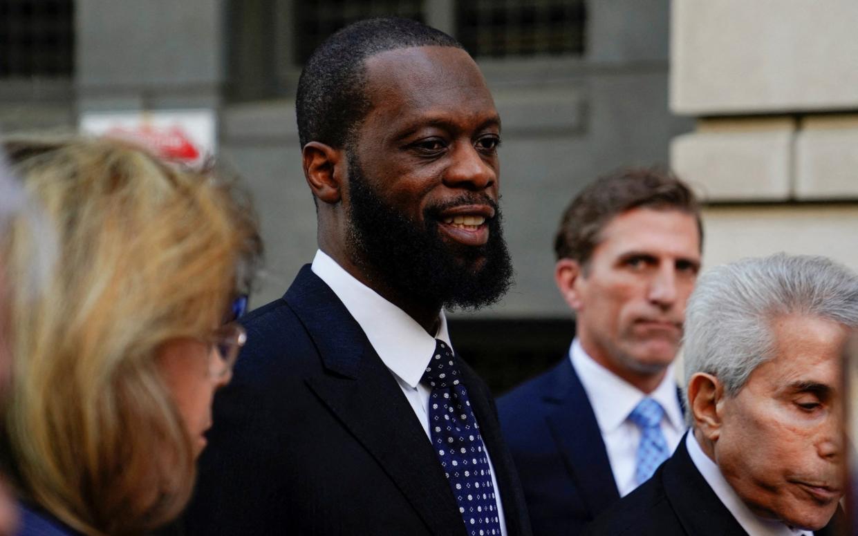 Grammy Award-winning rapper Prakazrel "Pras" Michel leaves the US federal court with his attorneys after being convicted - Retuers