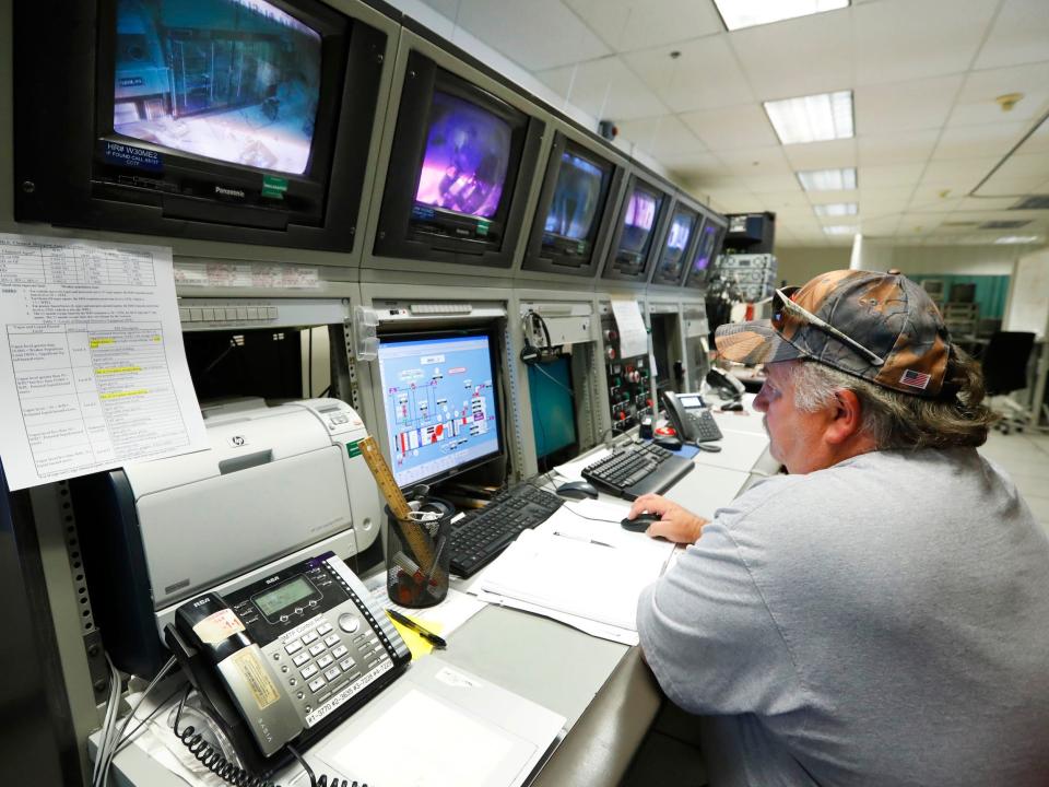 A technician monitors airflow in Dugway Proving Ground in 2017.