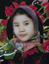 This undated photo released by the family shows Hassina Haidari,who was among nearly 100 people killed in bombing attacks outside her school on May 8, 2021. Hassina Haideri 13,, was forever in the kitchen helping her mother, says her father Alidad. She loved to cook but her dream was to become a doctor. She sold clothes she made in a nearby shop to earn extra money for her family. (AP Photo)