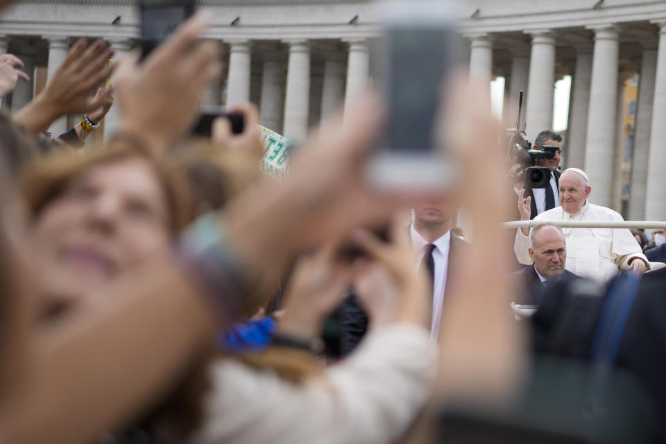 Pope Francis delivers his blessing as he leaves St. Peter's square at the Vatican after celebrating a mass for the canonization of two new saints, Giovanni Battista Scalabrini and Artemide Zatti, Sunday, Oct. 9, 2022. (AP Photo/Andrew Medichini)