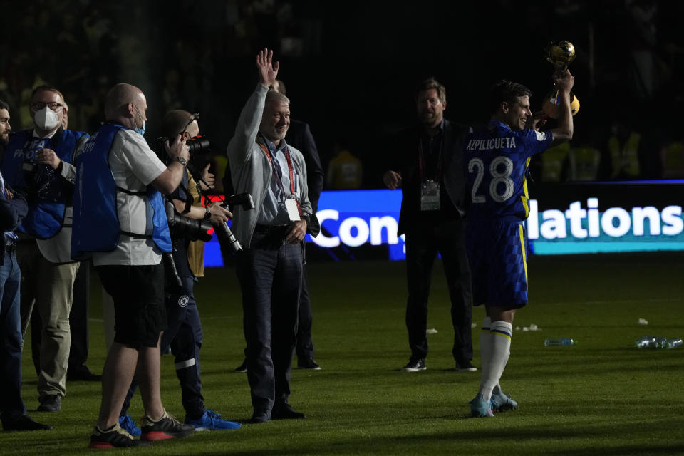 Chelsea owner Roman Abramovich waves after the Club World Cup final soccer match between Palmeiras and Chelsea at Mohammed Bin Zayed Stadium in Abu Dhabi, United Arab Emirates, Saturday, Feb. 12, 2022. (AP Photo/Hassan Ammar)