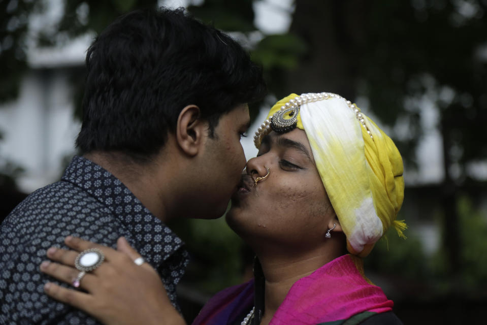 Gay rights activists share a kiss during a rally to commemorate the twentieth anniversary of the first pride parade in the country, in Kolkata, India, Saturday, June 29, 2019. (AP Photo/Bikas Das)