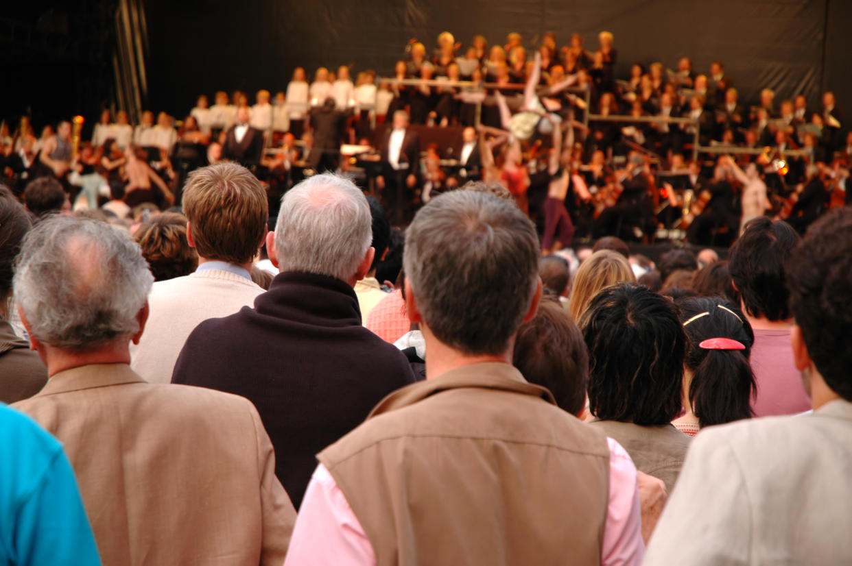 Crowd gathers for an outdoor opera at the Grand Place in Brussels, Belgium.