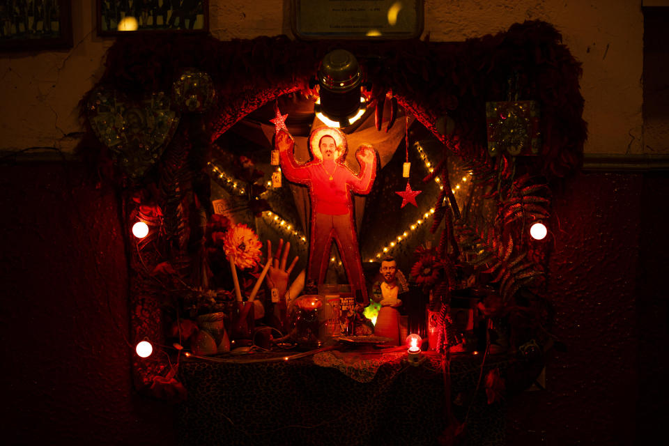 An altar in honor of Cuban Mambo King Damaso Perez Prado decorates a corner of the Salon Los Angeles during an event to raise money and keep open the iconic dance hall known as “The Cathedral of Mambo” amid the new coronavirus pandemic in Mexico City, Saturday, Sept. 5, 2020. Millionaires, writers, ambassadors, and movie stars danced here; now, shuttered for more than five months due to the pandemic, the owners of the fabled hall say they are in debt and may have to close and demolish it. (AP Photo/Fernando Llano)