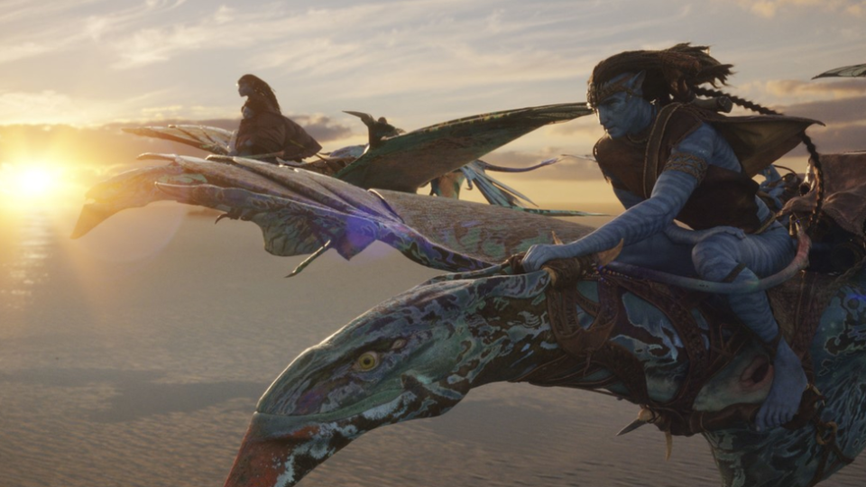Two Na'vi flying creatures high above the planet