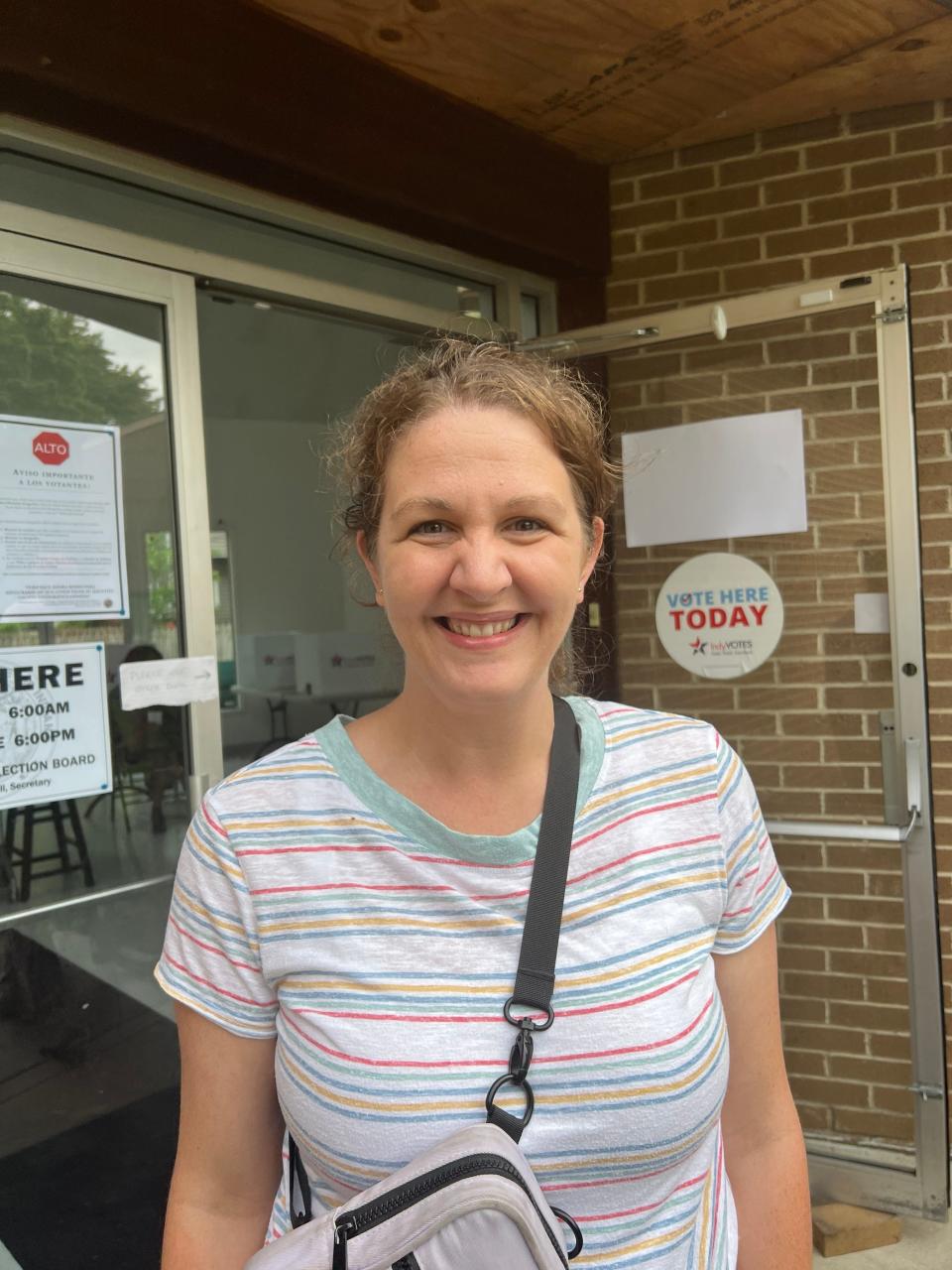 Megan Plotner said she's looking for a governor "willing to be in the middle" when she voted Tuesday morning.