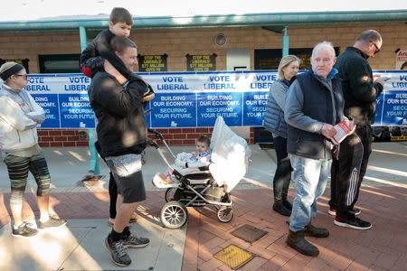 Voters line up at Landsdale Primary School on Election Day in Perth, Australia May 18, 2019. AAP Image/Richard Wainwright/via REUTERS
