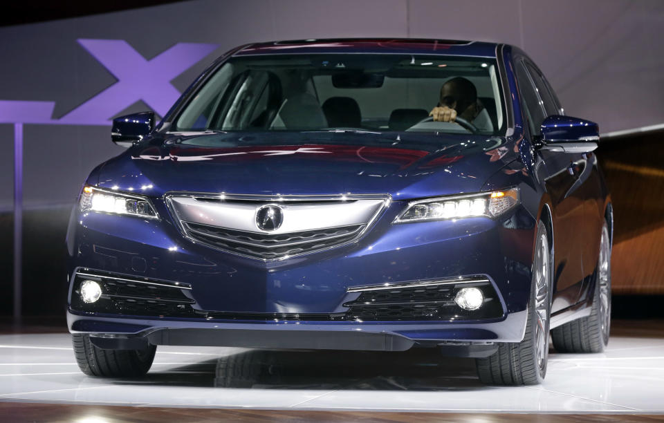 The 2015 Acura TLX is introduced at the 2014 New York International Auto Show at the Javits Convention Center, in New York, Wednesday, April 16, 2014. (AP Photo/Richard Drew)